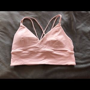 Light pink sports bra with strapped back